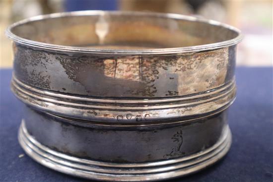 Two George III silver wine coasters, London, 1798 and 1814, two silver mounted brushes and a 19th century silver meat skewer.